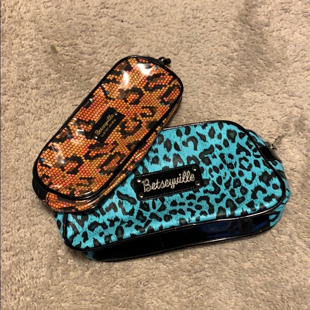 Two Betsey Johnson cosmetic bags